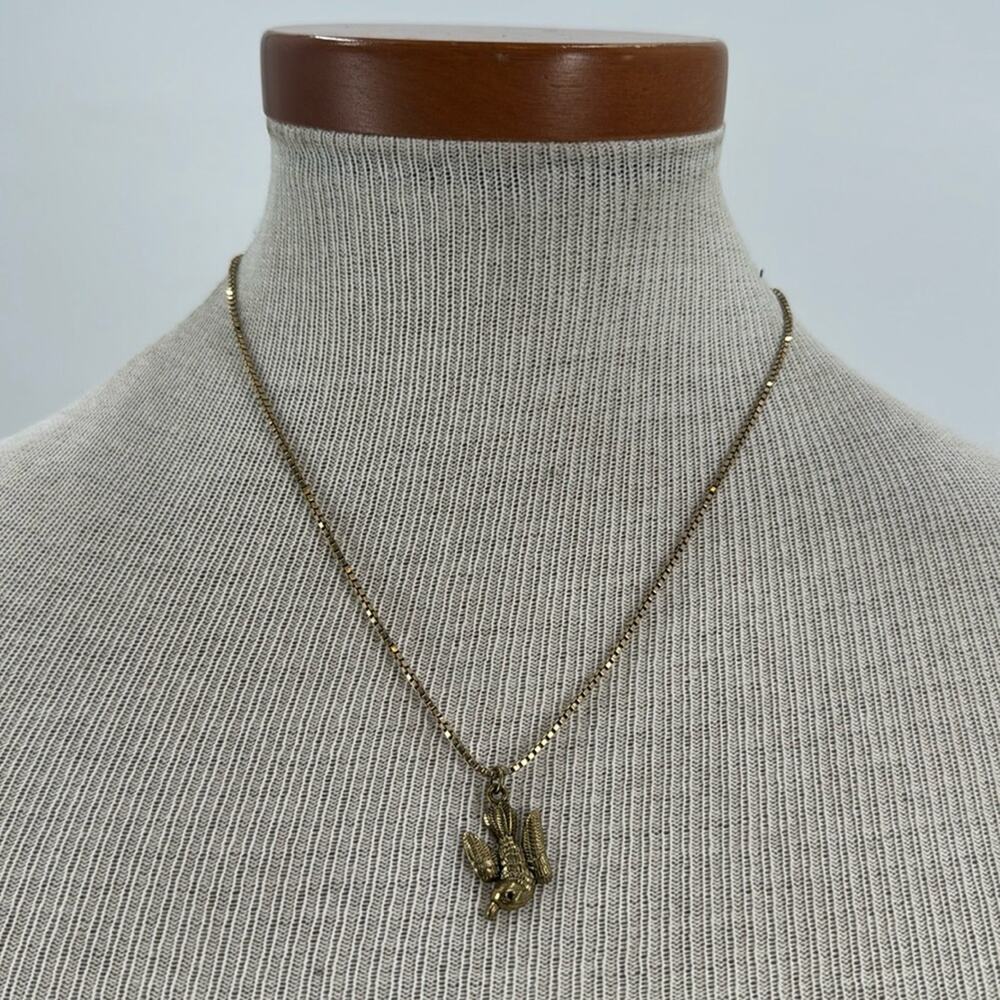 Gold plated driving sparrow necklace